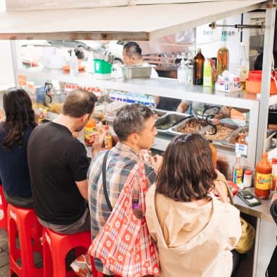 Vibrant street food scene in Juarez with diverse local dishes.