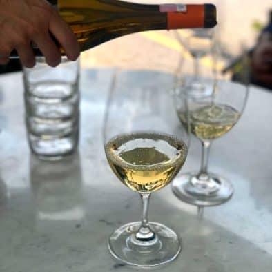 Refreshing white wine served during street food tasting.